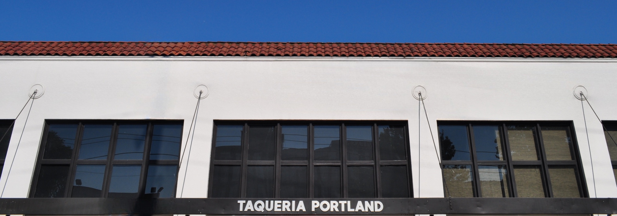 The Taqueria Portland storefront signage